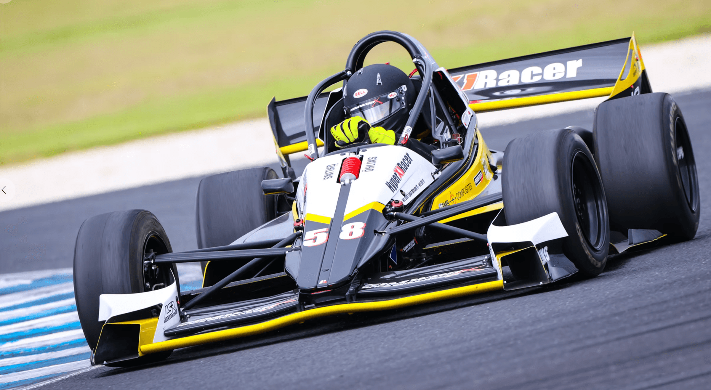 White and gold X1 on track