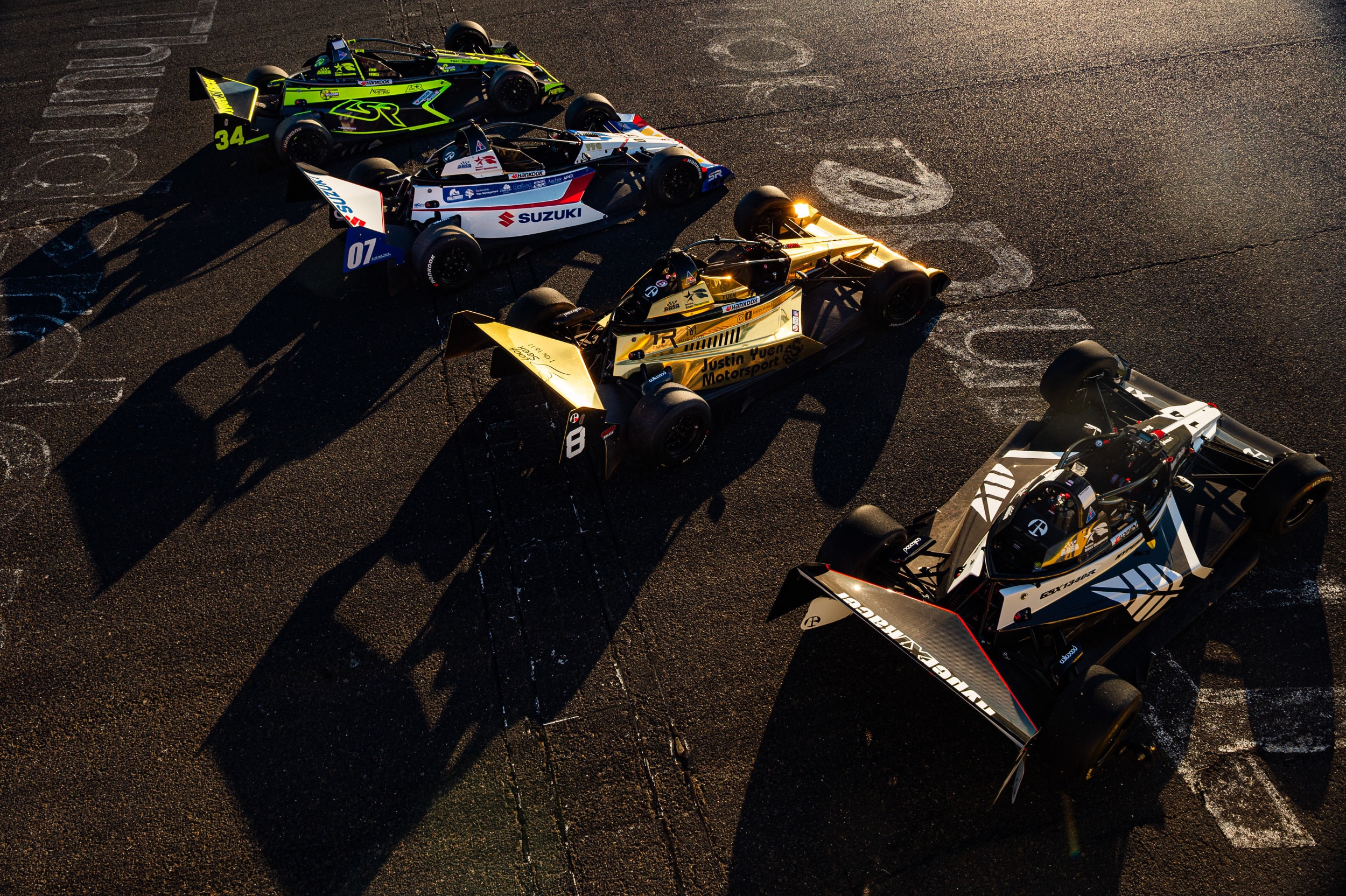 Four X1s at golden hour with long shadows