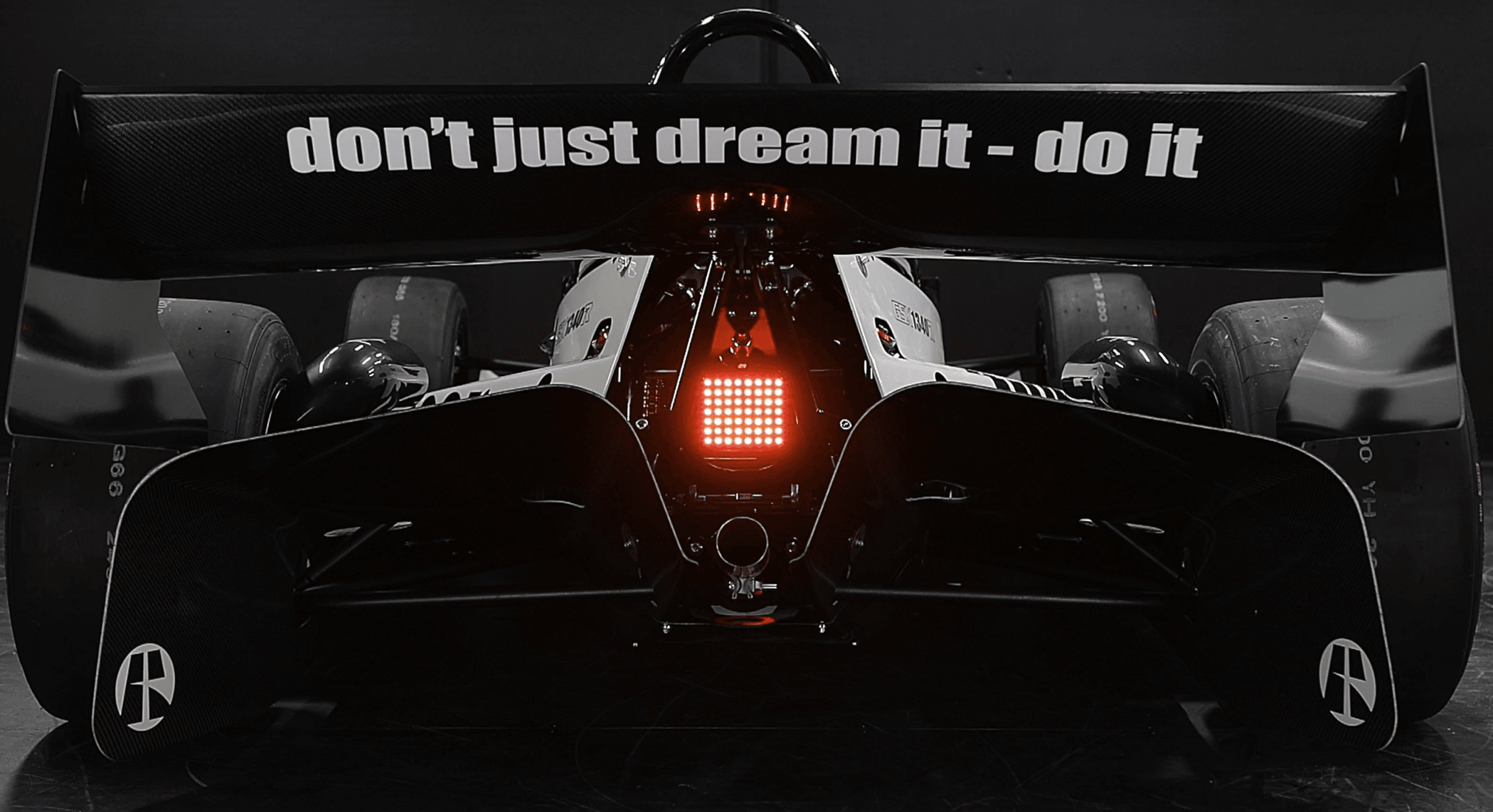 White X1 studio — rear wing with rain light