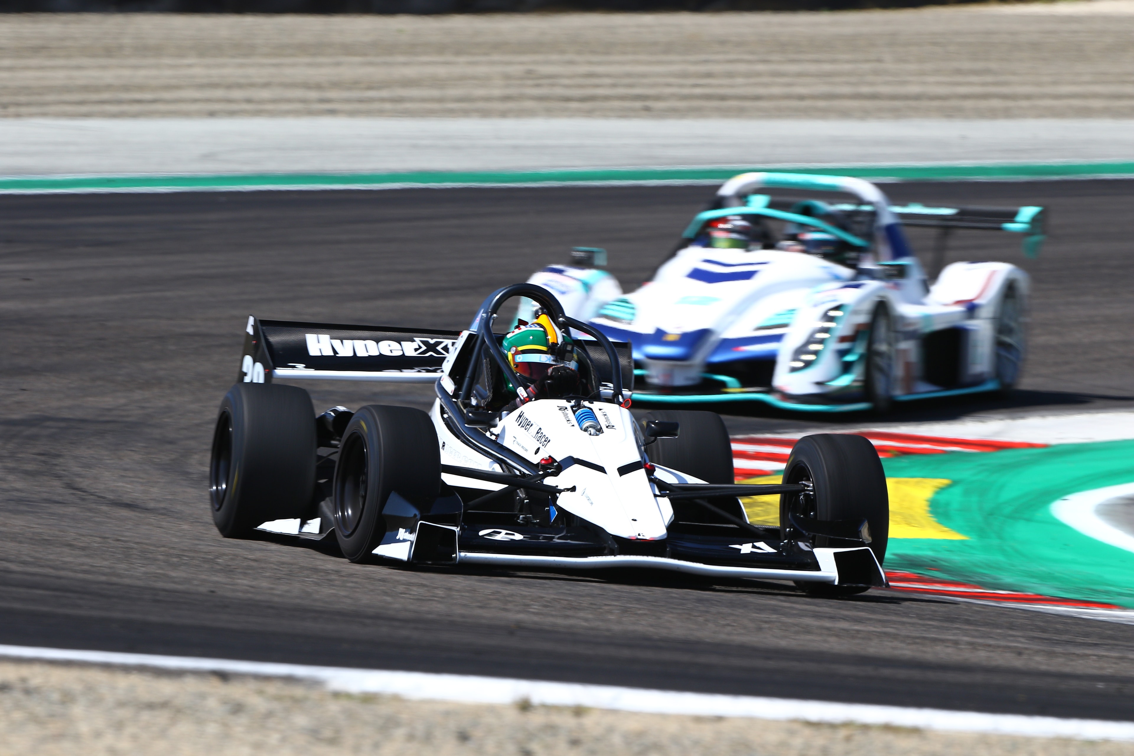 Side by side racing at Laguna Seca