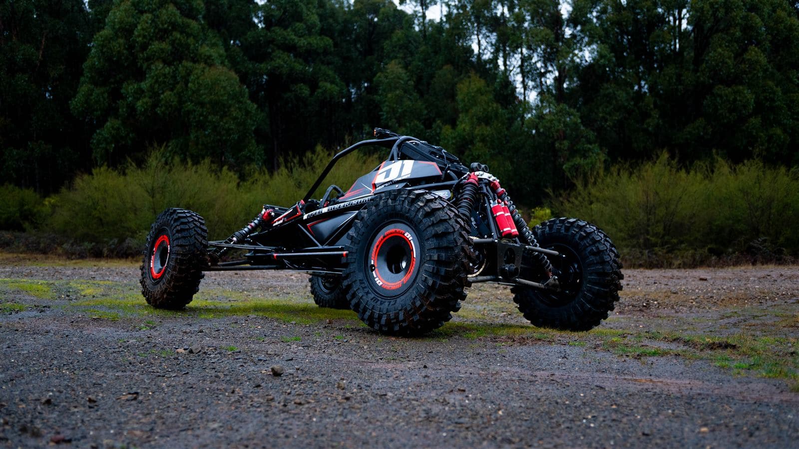 Hyper Racer D1 rear three-quarter showing the Kinetik RC rear coilovers