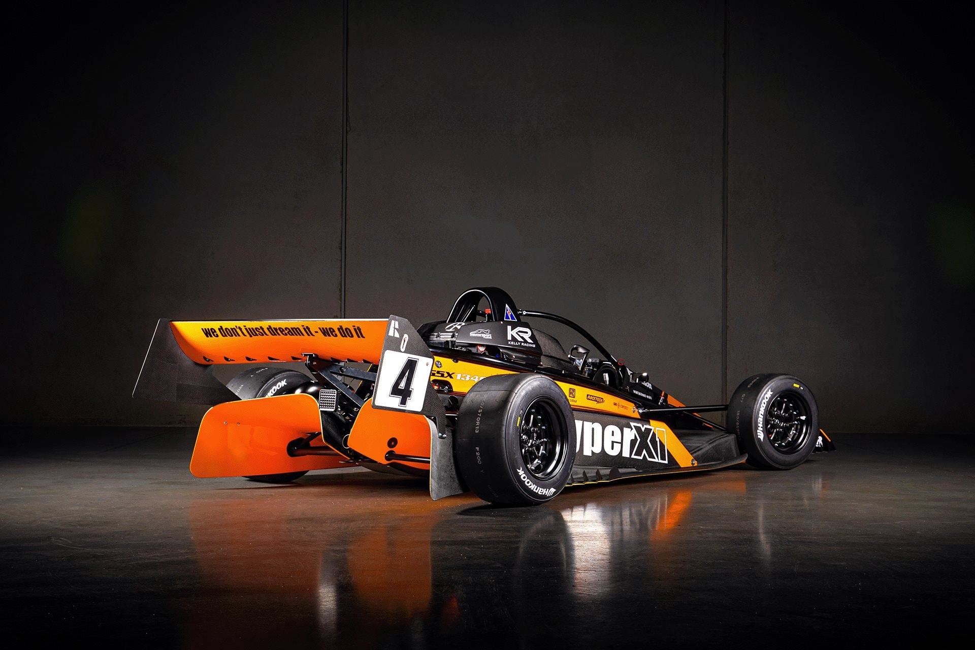 Hyper Racer X1 rear three-quarter, low angle — studio